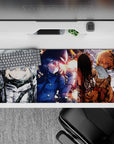 36x16 inches anime desk pad in icy grays, midnight blues, and ember orange with a fierce battlefield vibe.