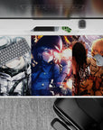 Sassy anime desk pad 40x20 inches in icy grays, midnight blues, and ember orange, crisp print for gaming.