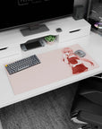 Shy pink-haired anime girl holding a knife mouse pad 32x16 inches, crisp silhouette on clean space.