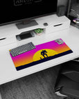Bold 28x12 mouse pad with stunning sunset hues of pink, orange, and purple, featuring a lone figure and mech companion for an epic atmosphere