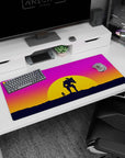 Adventure-inspired 36x16 anime desk mat with a silhouetted figure and mech against a vibrant sunset, creating a sense of epic journeys and solitude
