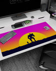 Epic 40x20 anime desk mat featuring a lone figure and mech companion silhouetted against stunning sunset hues for a futuristic, vibrant scene