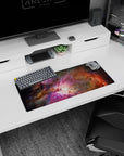 Space cloud scene mouse pad 28x12 inches featuring inky shadows and a glowing center like a window to space.