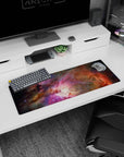 Cosmic cloud scene mouse pad 32x12 inches showing a glowing nebula center amid dark space.