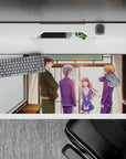 36x16 inches anime desk pad in soft afternoon sun, warm browns and navy uniforms with cozy glow.