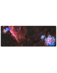Galaxy swirl desk mouse pad, 32x12 inches, with stardust speckles and nebula accents.