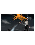 Mouse pad featuring Hollow Ichigo, 32x16 inches, with his bone mask, orange hair, and massive sword for a menacing vibe.