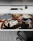 36x16 inches anime desk pad in warm cream with red splatter accents, high-energy chaotic vibe.