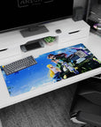 Couple on a jeep anime desk pad 36x16 inches, green-clad guy with red-bow girl clinging close.