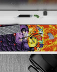 Eerie 36x16 desk pad highlights Itachi's shadowy aura with a blood-red moon and crow motif for bold style