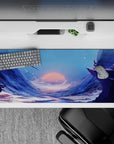 Calm dramatic anime desk pad 36x16 inches in deep blues and icy purples with a glowing coral sun.