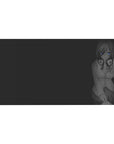 Anime girl desk pad 40x20 inches with glossy blue eyes, big headphones, and dark clean background.
