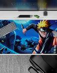 Moonlit blue anime desk pad 40x20 inches with bright orange-gold hair accents and fast ninja energy.