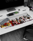 Anime girl desk pad 40x20 inches showing armored heroines with capes, glossy weapons, and a mech.