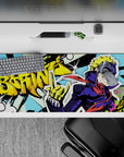 Desk pad 36x16 inches featuring Ryuji from anime with vibrant comic book style, neon yellows, and "Freakin’ Boring!" graffiti.