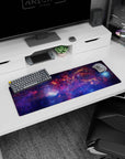 Star-sprinkled nebula scene desk mouse pad, 32x12 inches, swirling space clouds across the surface.