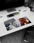 Okabe Rintarou in lab coat with phone beside Kurisu Makise on anime mouse pad 28x12 inches.