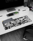 32x12 inches Tomoko Kuroki mouse pad showing her deadpan stare, shy slouch, and panic eyes.
