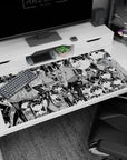 40x20 inches WataMote desk pad featuring Tomoko Kuroki’s deadpan stare, messy bangs, and mini scenes.