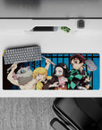 32x12 inches mouse pad with the Demon Slayer squad, Tanjiro, Nezuko, Zenitsu, and Inosuke, showcasing their dynamic and vibrant personalities.