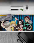 36x16 inches desk pad featuring the Demon Slayer squad—Tanjiro, Nezuko, Zenitsu, and Inosuke—capturing their dynamic energy and iconic look.