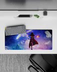 Anime mouse pad 28x12 inches featuring Megumin from Konosuba with a dramatic sky, comets, and glowing staff in purples.
