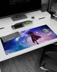 Megumin anime desk pad 36x16 inches featuring a dramatic sky scene with a glowing staff and comet-streaked clouds.