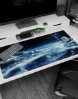 40x20 inches desk pad featuring a distant planet over curling icy clouds in a dark midnight sky.