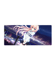 28x12 inches anime girl mouse pad with peach-haired girl, blue eyes, and a neon city skyline backdrop.