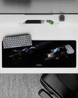 Smoky black cosmic mouse pad 32x12 inches with cool blue glow and crisp orange panel accents.