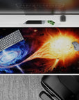 Icy blue nebula meets blazing orange sunrise desk pad 40x20 inches, calm yet fiery mood with glowing swirl.