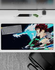 Demon Slayer anime mouse pad 32x16 inches featuring Tanjiro with water dragon, bold colors, dynamic energy, and focus.