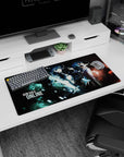 Anime mouse pad 32x16 inches featuring heroine with glowing sword, black armor, and partner in coat and scarf.