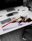 36x16 inches Ryuko Matoi desk pad, jet-black hair whipping as she lunges forward with a blazing blade.