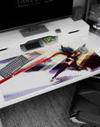 Ryuko Matoi anime desk pad 40x20 inches, jet-black hair whipping as she lunges forward with blazing blade.