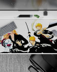 Epic evolution 40x20 desk pad with Ichigo's transformation, from human to Hollow and Soul Reaper to ultimate warrior, perfect for Bleach fans