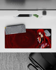 Rias Gremory from High School DxD in devil form on 28x12 inch anime mouse pad, red hair, blue eyes, dark backdrop.