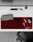 Rias Gremory from High School DxD in devil form on a 32x12 inch anime mouse pad, red hair and wings against a dark backdrop.