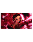 Anime mouse pad featuring Tanjiro Kamado from Demon Slayer: Kimetsu no Yaiba, 32x16 inches, perfect for fans seeking bold desk accessories.