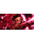 Tanjiro Kamado from Demon Slayer: Kimetsu no Yaiba on a 36x16 inches desk pad, blending dynamic energy with sleek design for anime fans.