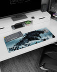 32x12 inches anime mouse pad showing charcoal-scaled titan with jagged spines towering above fleeing ships.