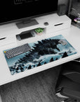 32x16 inches anime mouse pad showing a charcoal-scaled titan with jagged spines towering above ships.