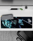 Tanjiro from Demon Slayer in action on a 32x12 inch anime mouse pad, showcasing dynamic water-breathing style artistry.