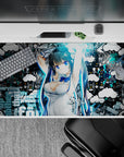 40x20 inches desk pad in electric cyan and deep black, edgy urban mood with bright blue-eyed anime art.