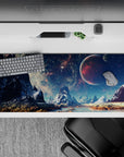 Moody navy and teal space haze desk pad with speckled stars, 36x16 inches.