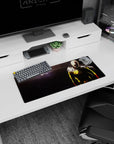28x12 inches One Punch Man mouse pad showing Saitama calm as his cape snaps in a smoky cratered battlefield.