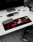 Small but impactful 32x12 mouse pad showcases anime-inspired defiance with striking contrasts and fiery elegance