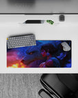 28x12 inches anime mouse pad in blue-violet mist with warm orange sparks, calm late-night fantasy vibe.