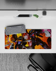 28x12 inches anime mouse pad in hot orange and gold with black steel greys and neon green eyes.