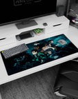 Tanjiro and Nezuko from Samurai Spirits on a 36x16 inches desk pad, blending vibrant anime visuals with functional workspace design.